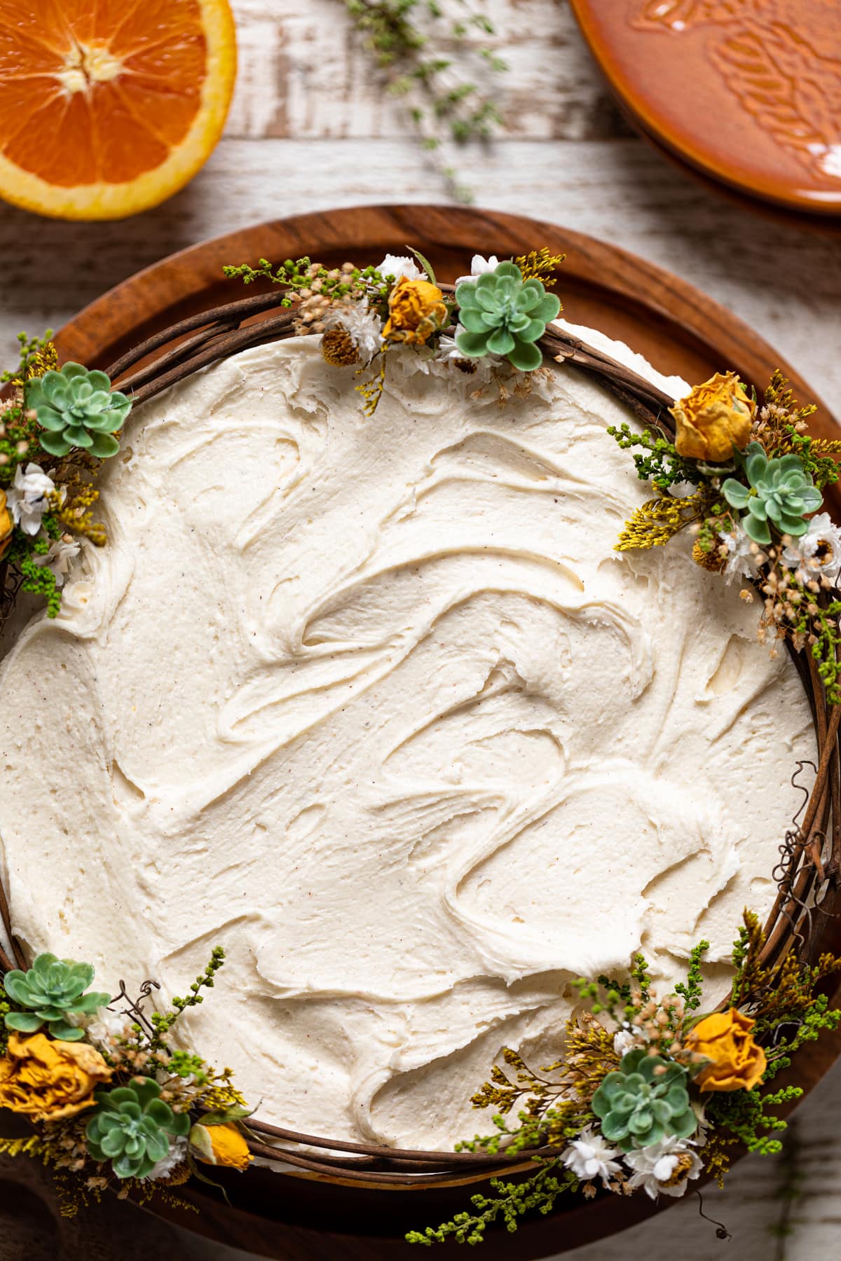 Closeup of a Vegan Carrot Cake with Orange-infused Frosting