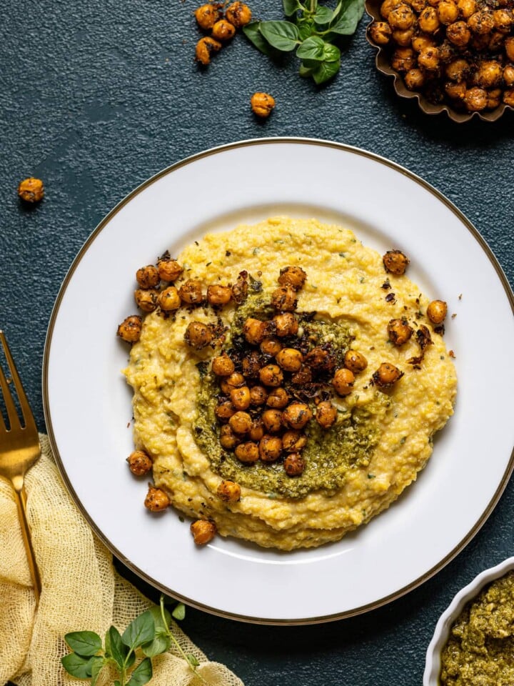 Plate of Vegan Cheese Polenta with Pesto and Chickpea