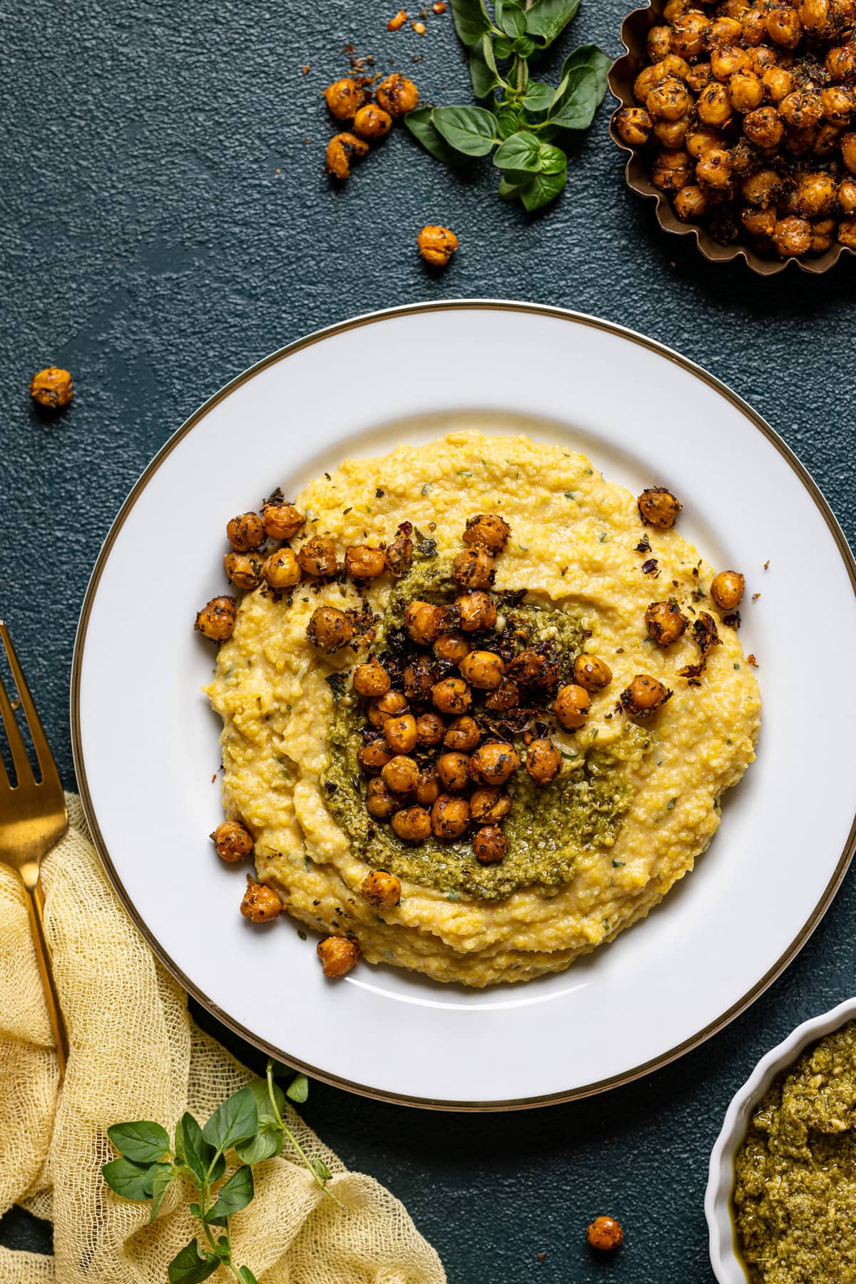 Plate of Vegan Cheese Polenta with Pesto and Chickpea