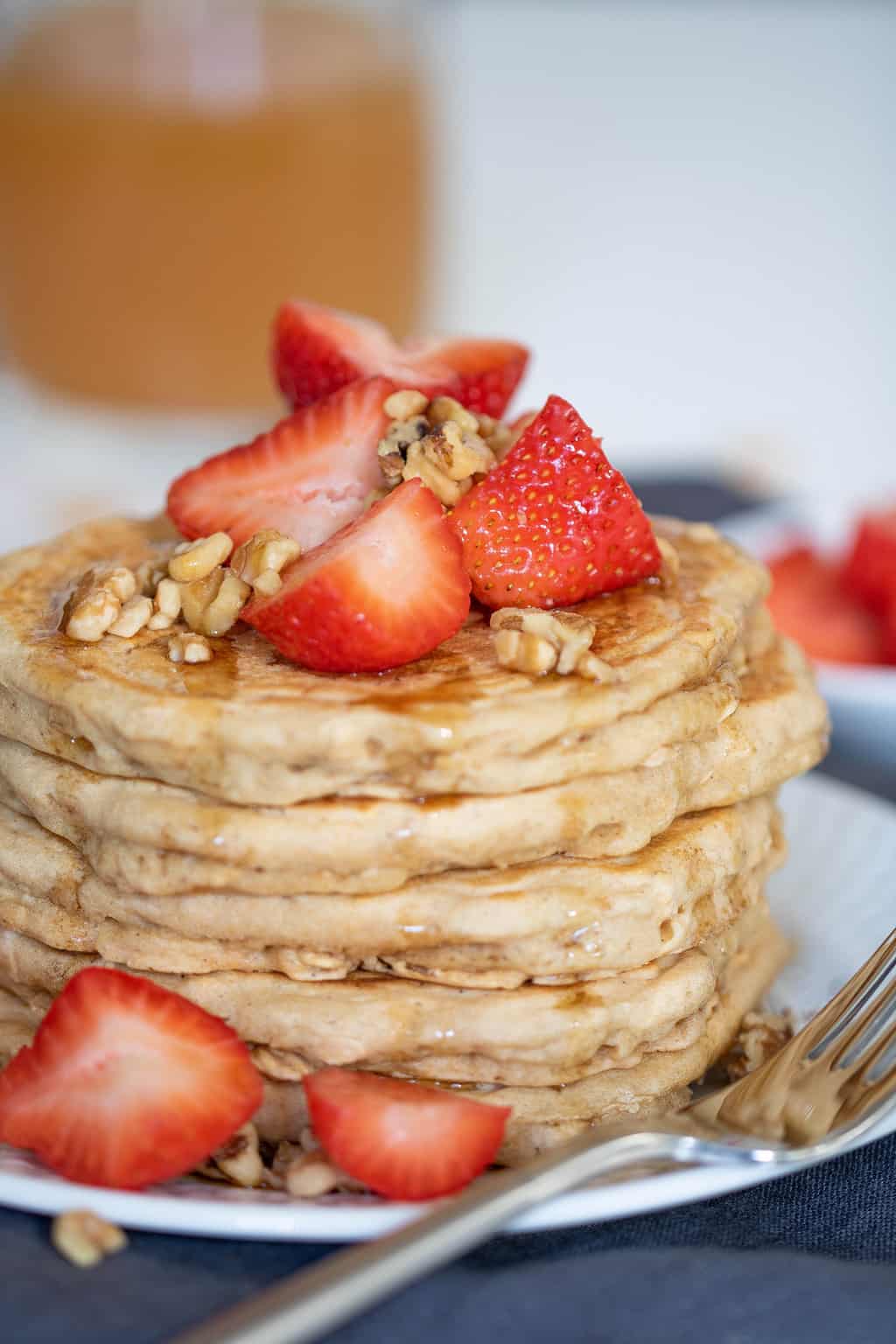 Stack of Fluffy Vegan Oatmeal Whole Wheat Pancakes.