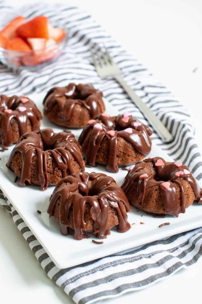 Mini Chocolate Brownie Bundt Cakes with heart-shaped sprinkles.