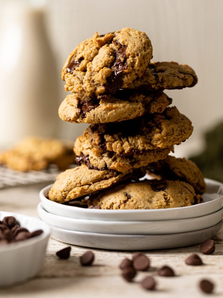 Stack of Vegan Chocolate Chip Cookies on three small, stacked plates