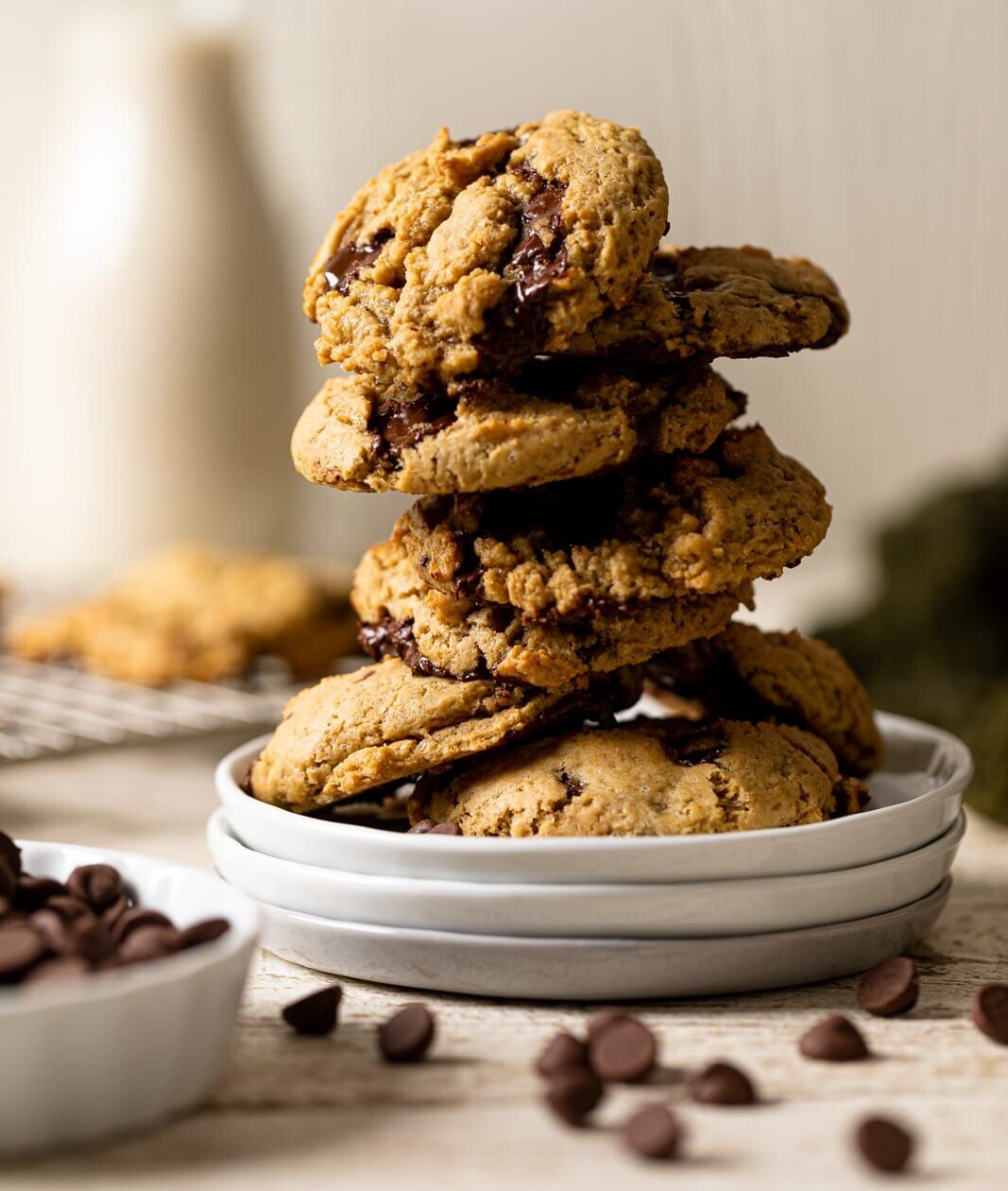 Stack of Vegan Chocolate Chip Cookies on three small, stacked plates