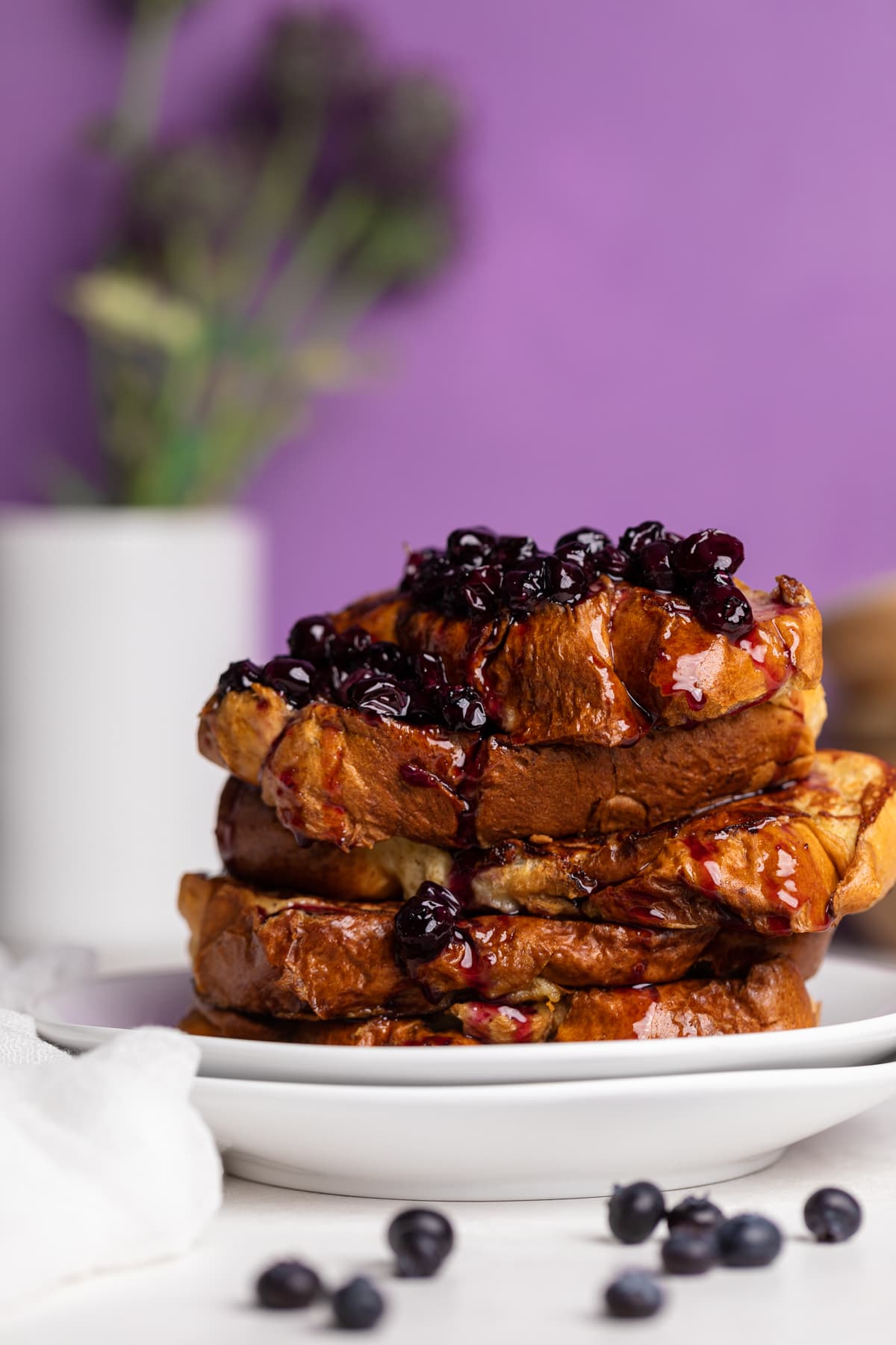 Dairy-Free Blueberry French Toast topped with blueberries.