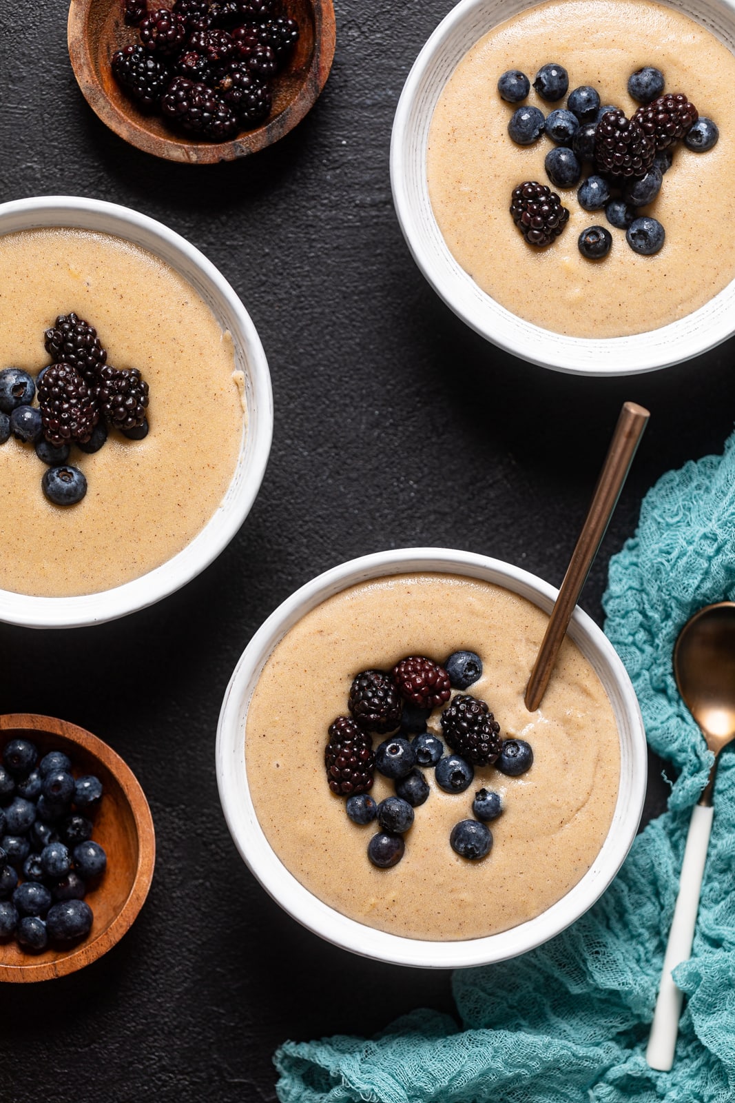 Three bowls of Creamy Jamaican Cornmeal Porridge