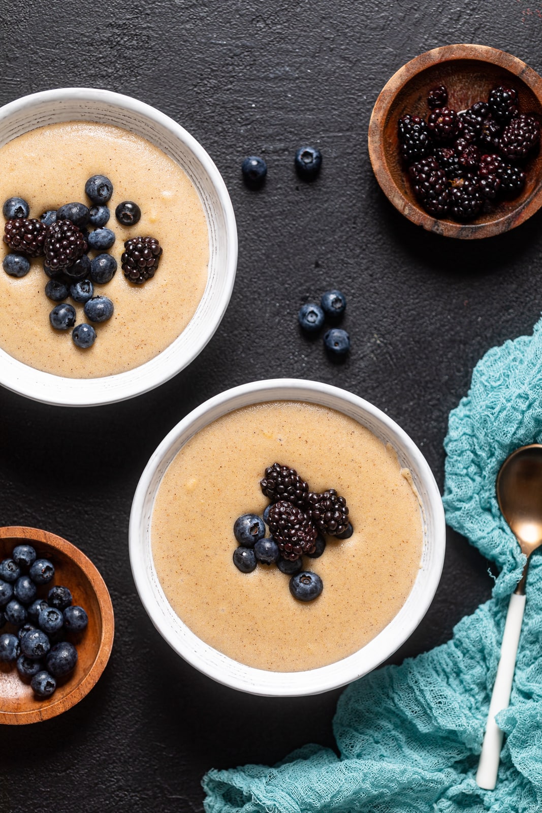 Two bowls of Creamy Jamaican Cornmeal Porridge