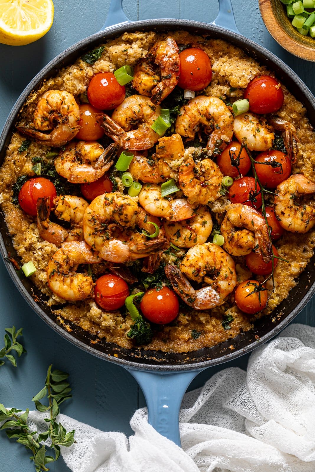 Overhead shot of a pan of Spicy Cajun Shrimp, Kale, and Cauliflower Rice