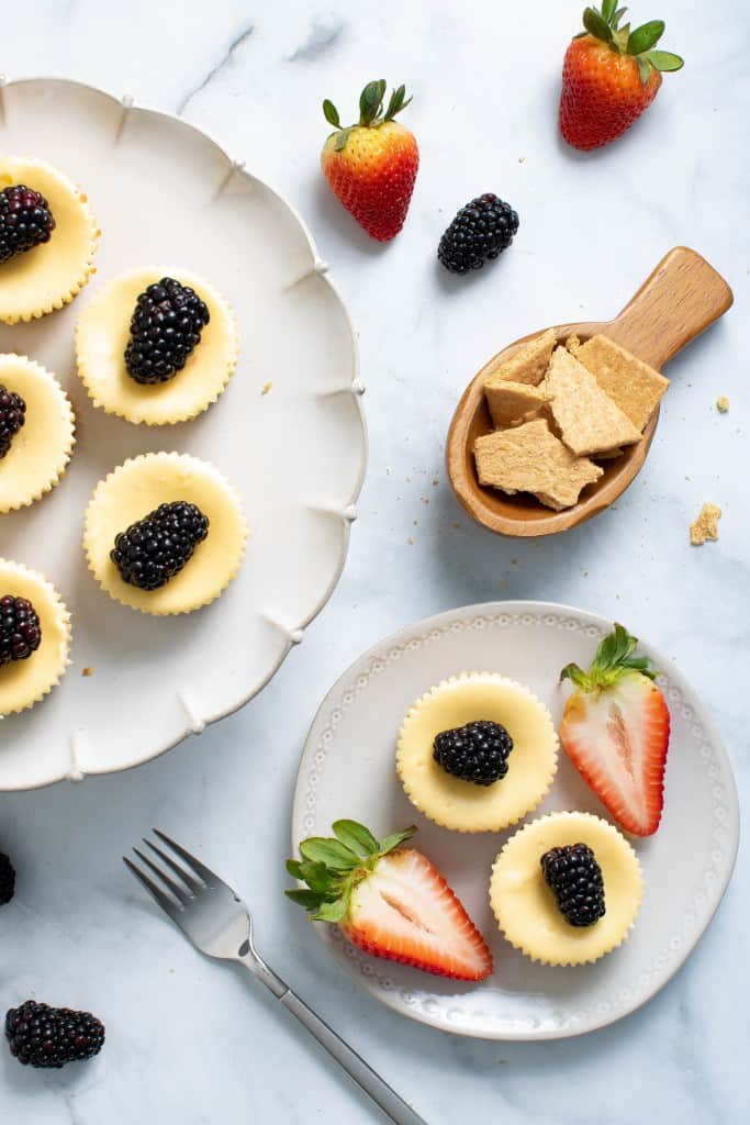 New York-Style Cheesecake Bites on a platter and a plate.