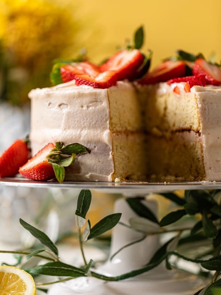 Lemon Strawberry Layer Cake missing a slice