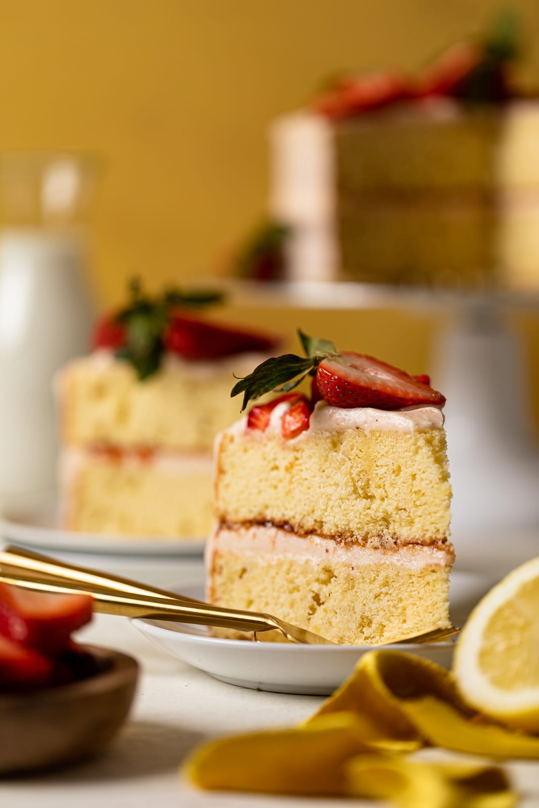 Slice of Cake with two forks on a small plate