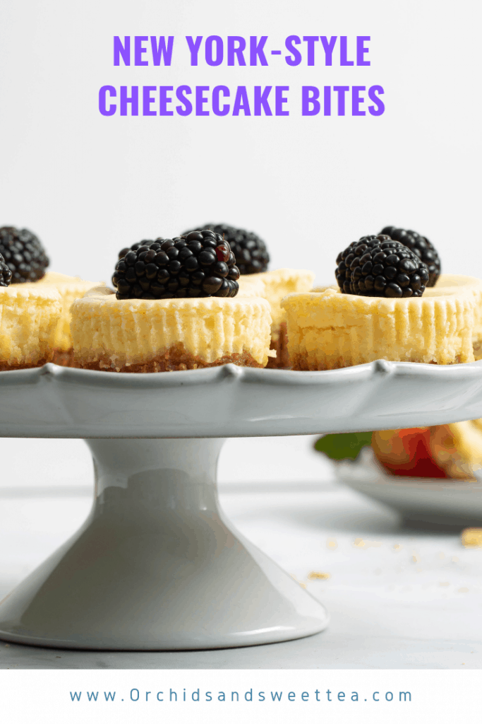 Raised, fluted platter of New York-Style Cheesecake Bites.