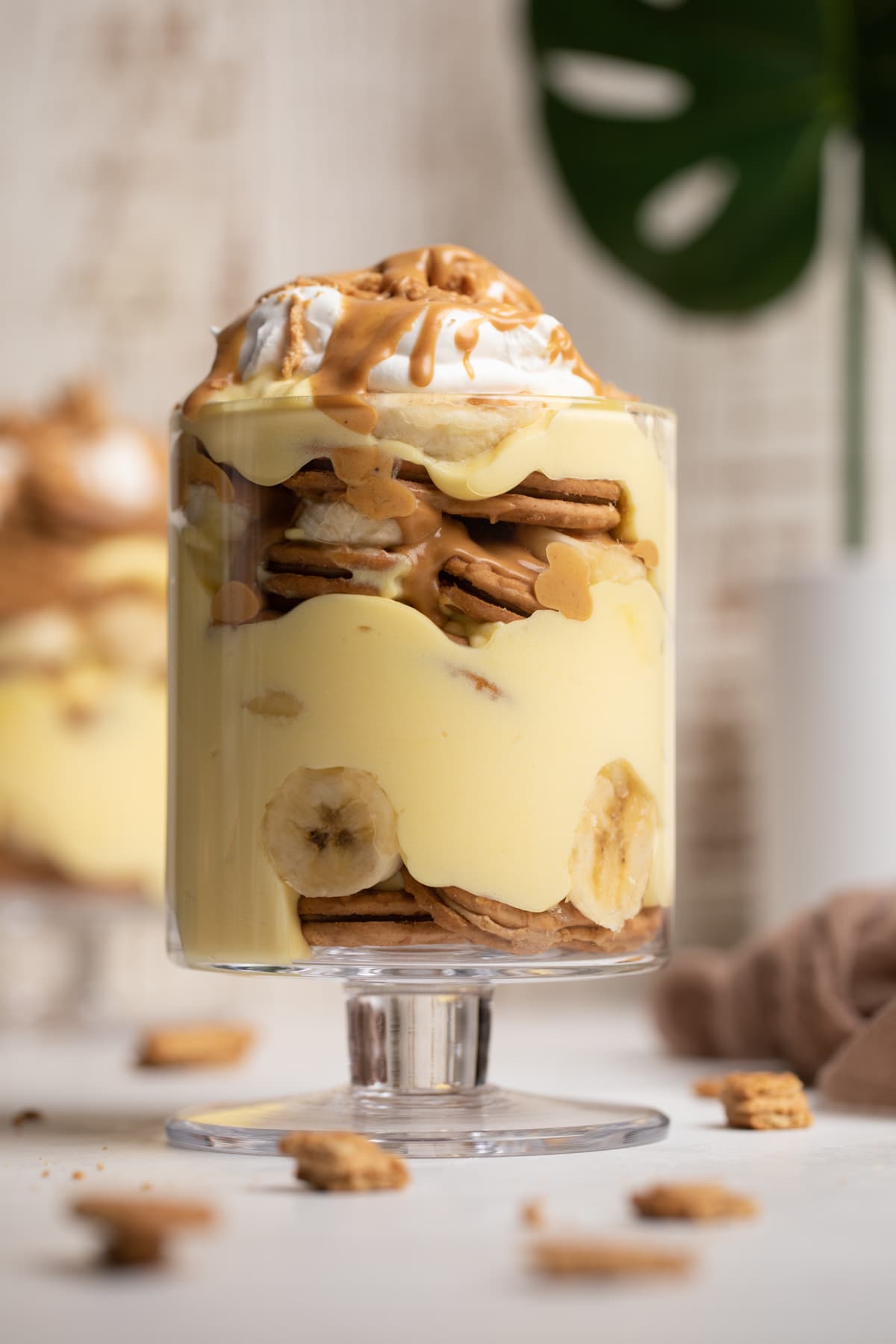 Peanut Butter Banana Pudding on a white table.