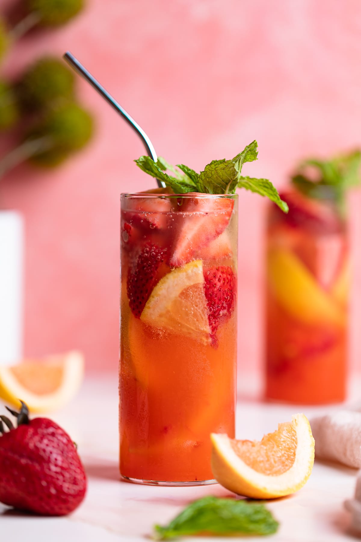 Metal straw in a Strawberry Grapefruit Mint Spring Soda.