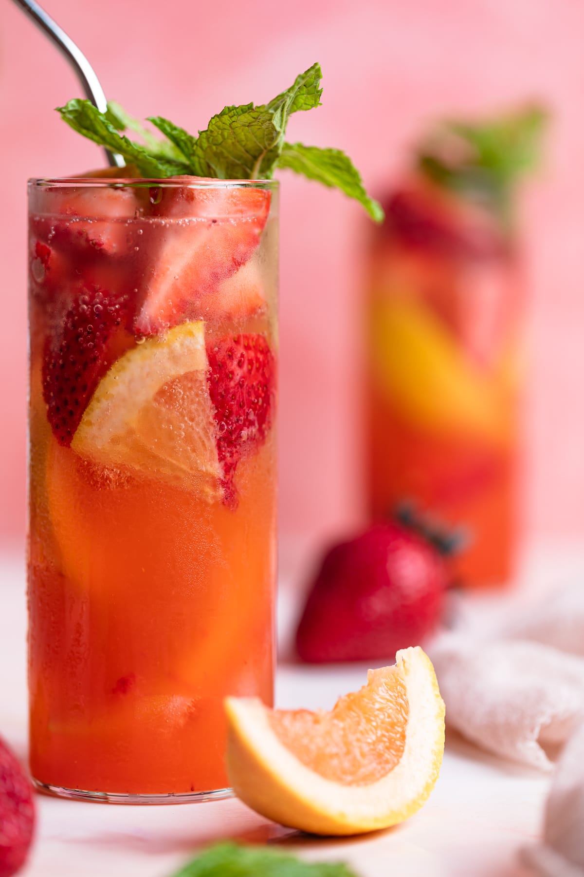 Strawberry Grapefruit Mint Spring Soda loaded with strawberries and grapefruit pieces.