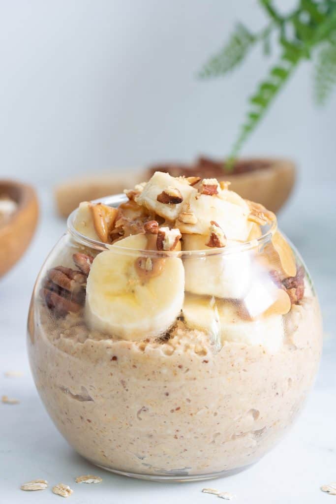 Banana Peanut Butter Overnight Oats in a small glass.