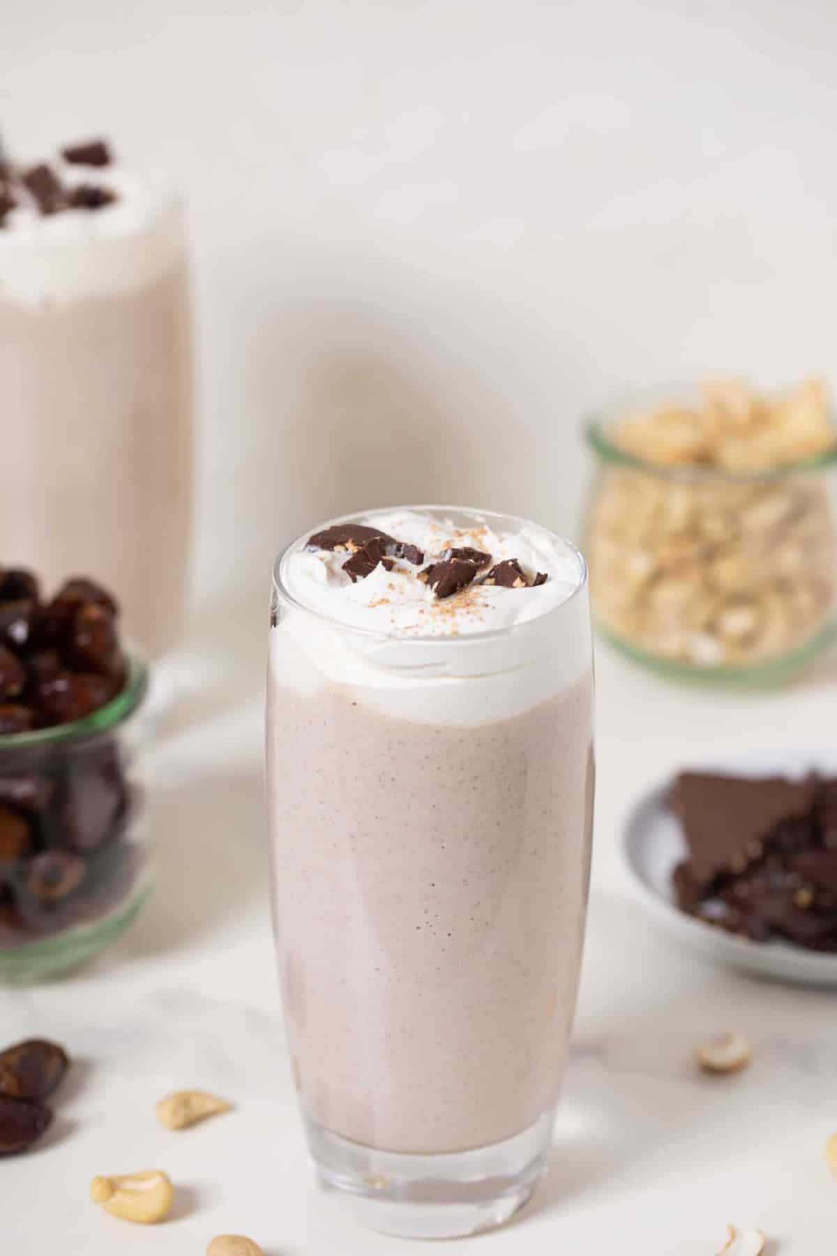 Cashew Date Morning Shake in a tall glass.