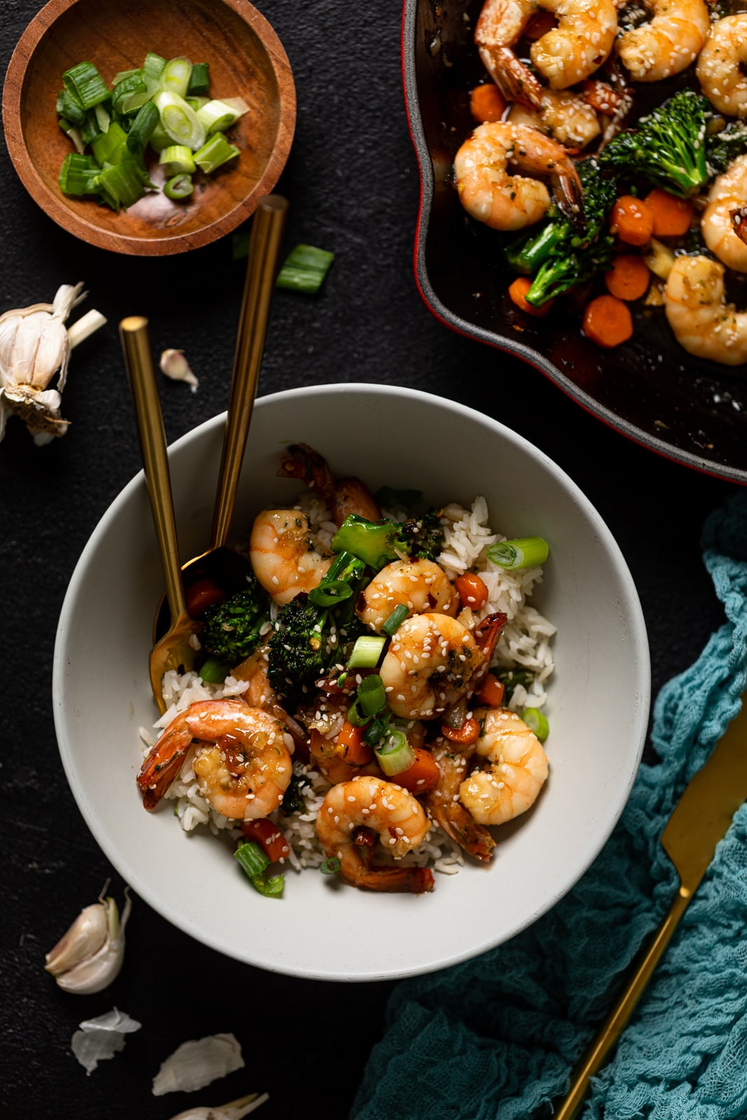 Bowl of Honey Garlic Shrimp with Broccoli with utensils