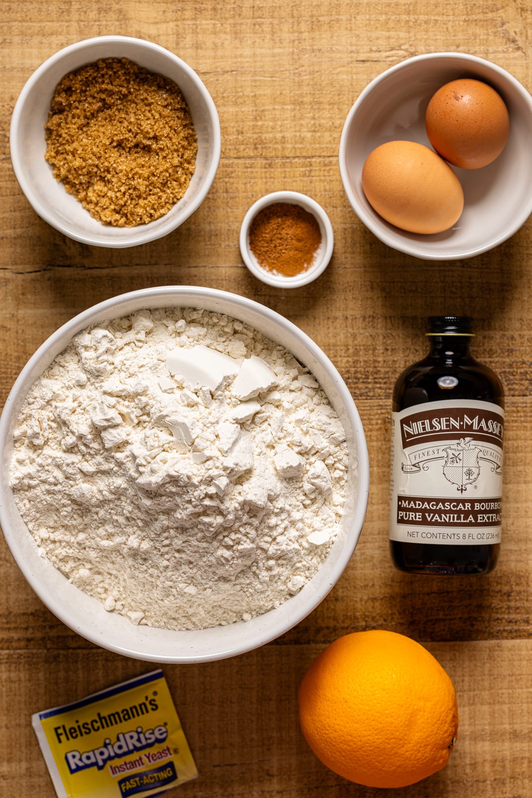 Ingredients on a brown wood table.