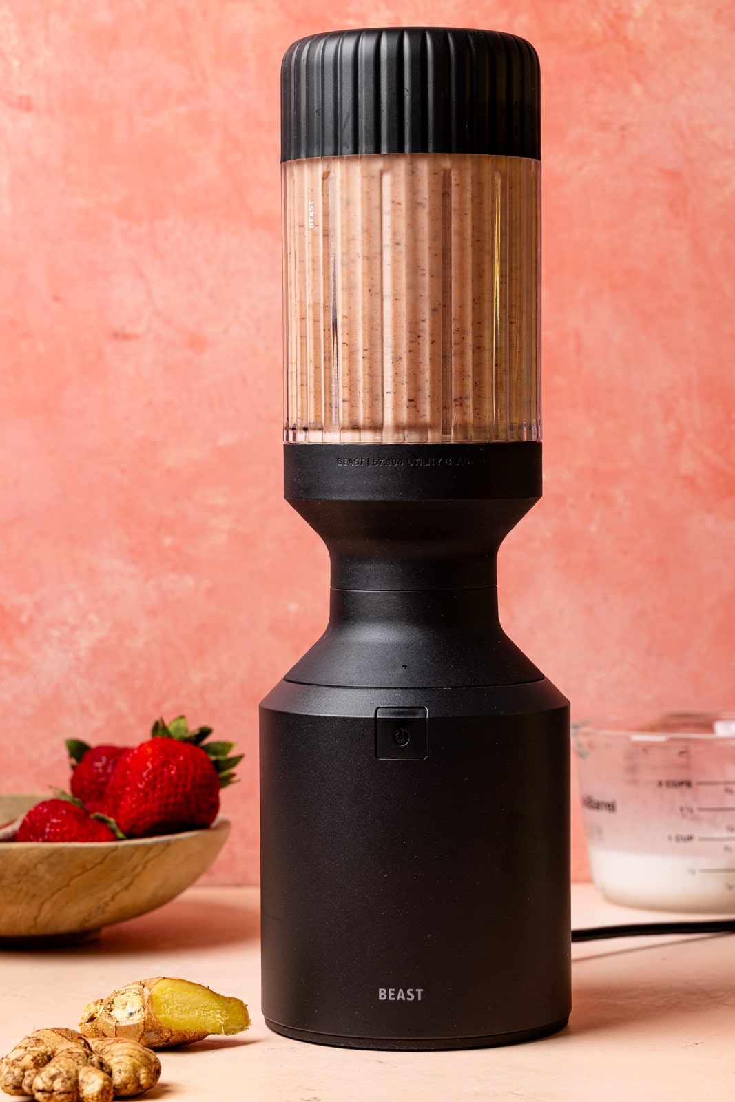 Smoothie in a black blender.