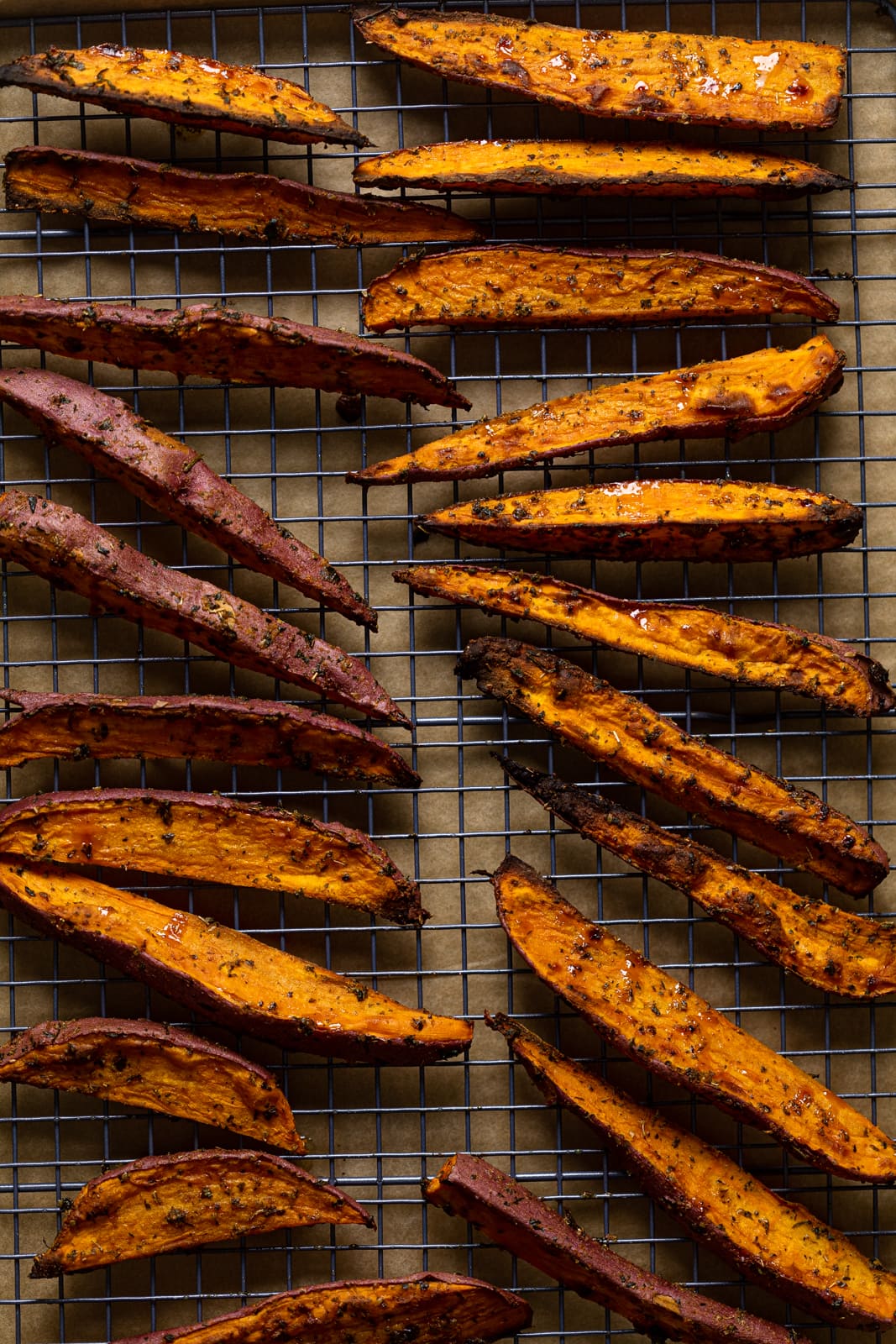 Spicy Honey Sweet Potato Wedges on a wire rack