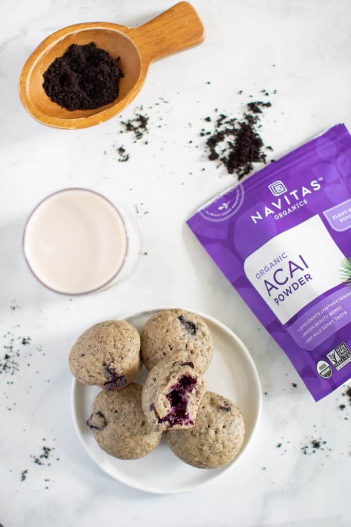 Vegan Blueberry Acai Mini Muffins next to a bag of Navitas acai powder.