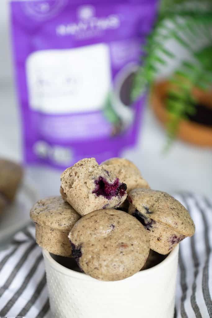 Small bowl of Vegan Blueberry Acai Mini Muffins.