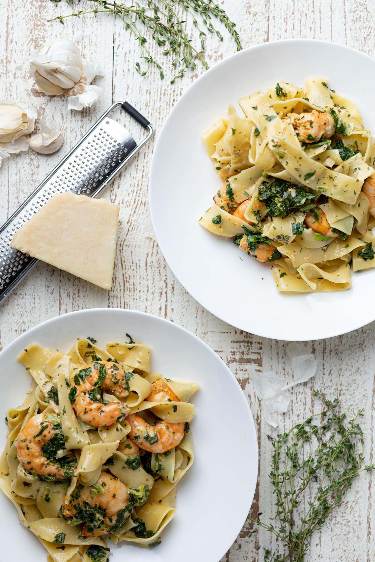 Two plates of Savory Lemon Garlic Shrimp Pasta.