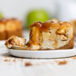 Slice of Caramel Apple Spice Cheesecake with the end cut off.