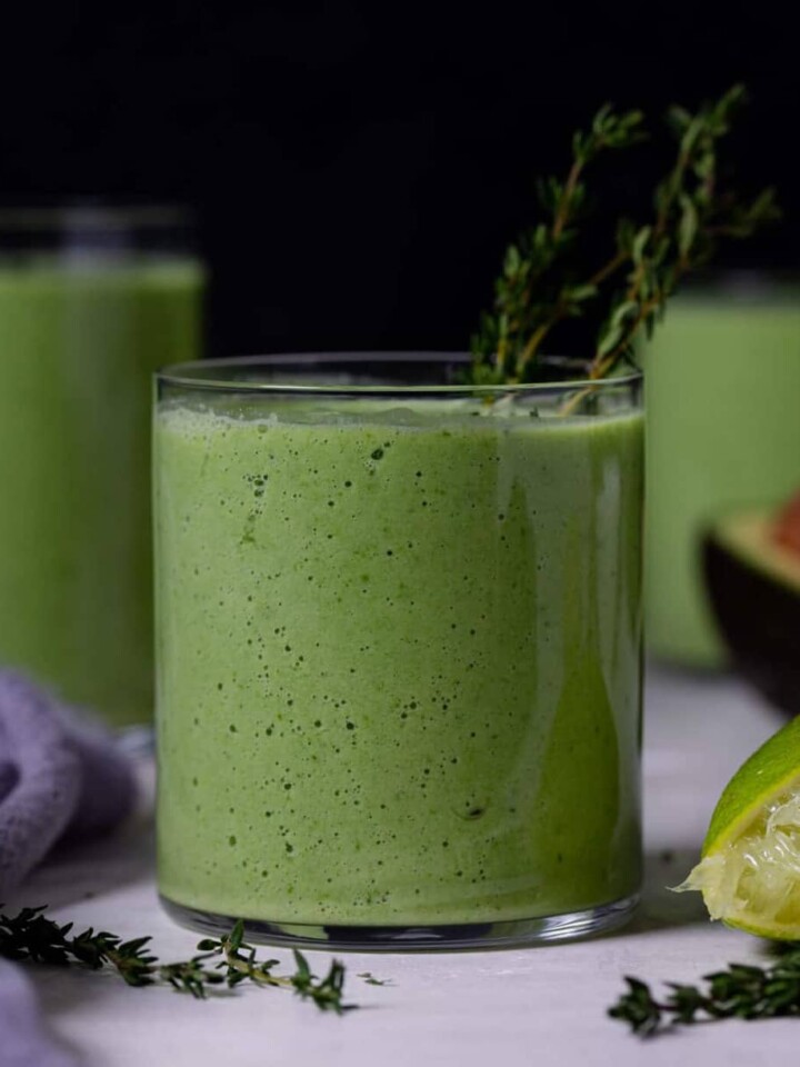 Small glasses filled with Super Green Detox Smoothie.