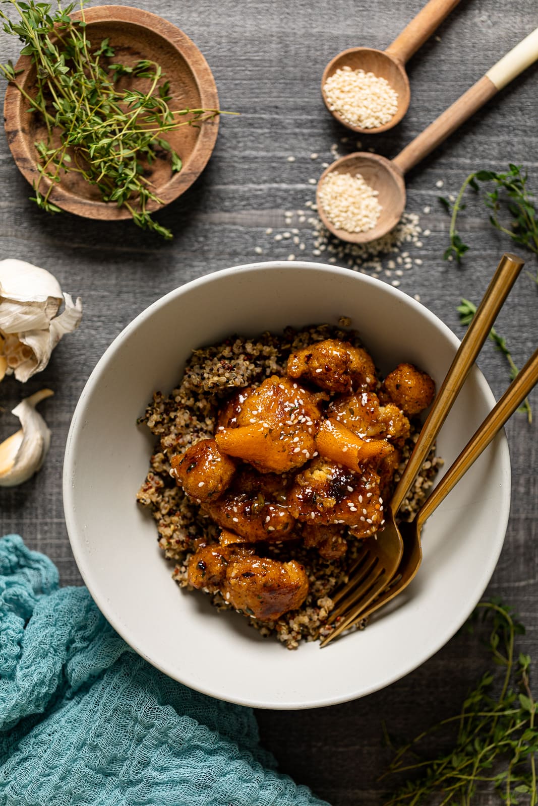 Overhead shot of a bowl of Baked Sticky Orange Cauliflower with Quinoa