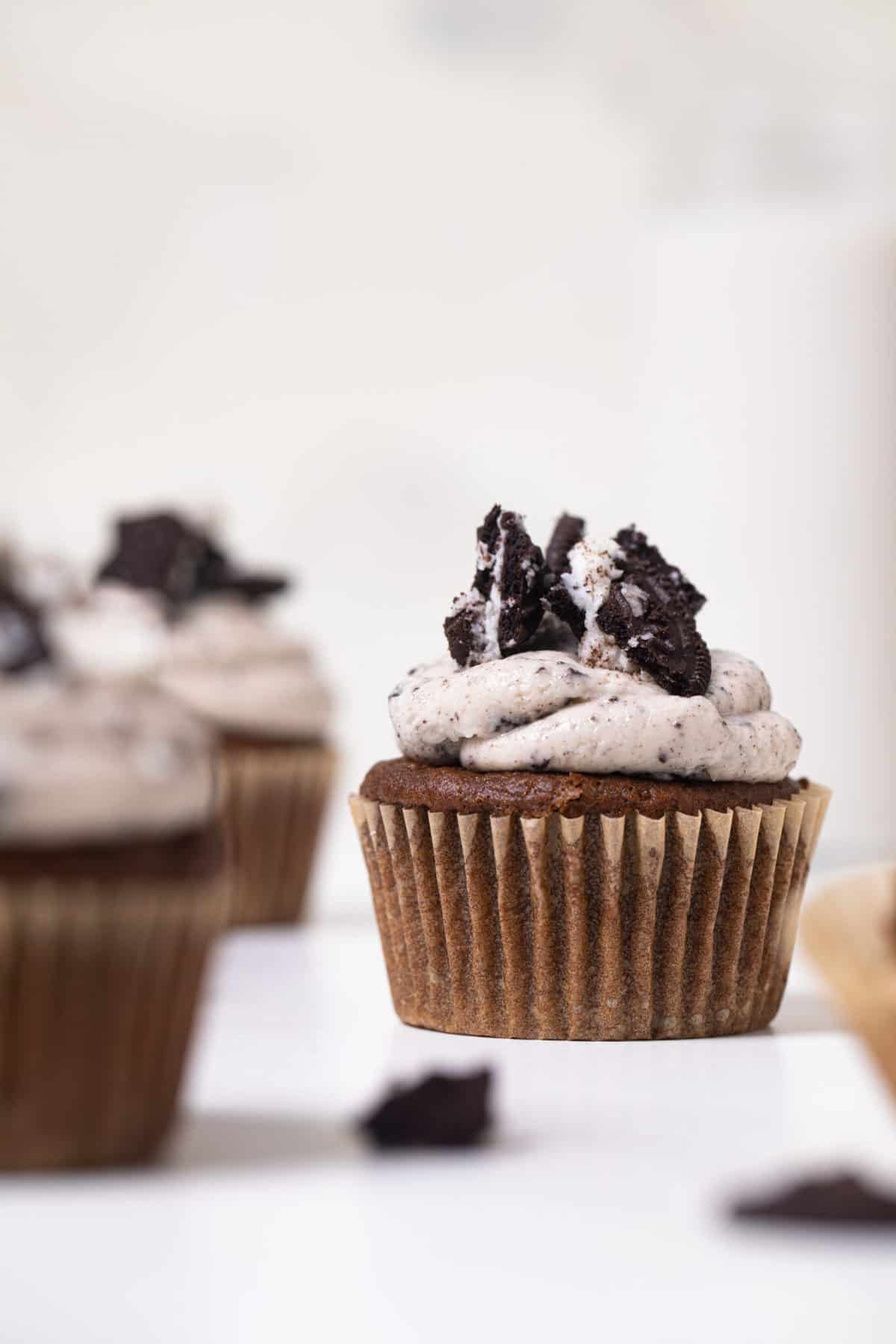 Vegan Chocolate Oreo Cupcakes on a white countertop.