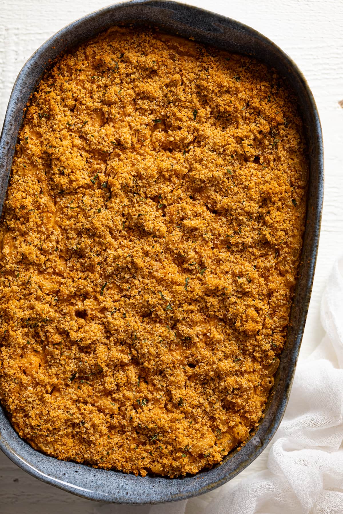 Baking dish of Vegan Buffalo Mac and Cheese.