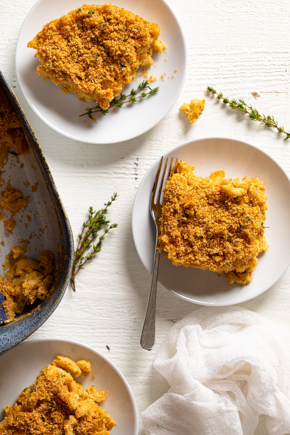 Slice of Baked Vegan Buffalo Mac and Cheese on a plate.