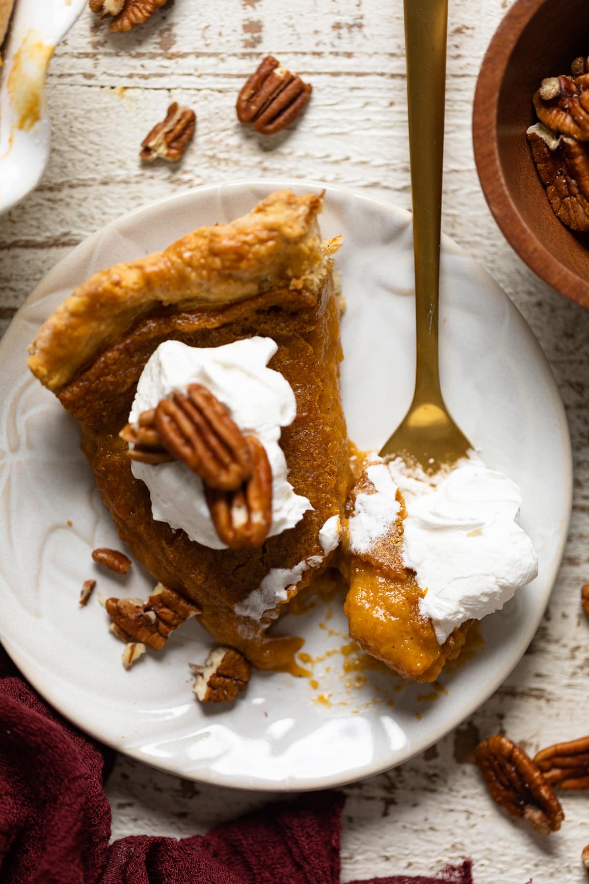 Fork with a piece from a slice of Vegan Sweet Potato Pie