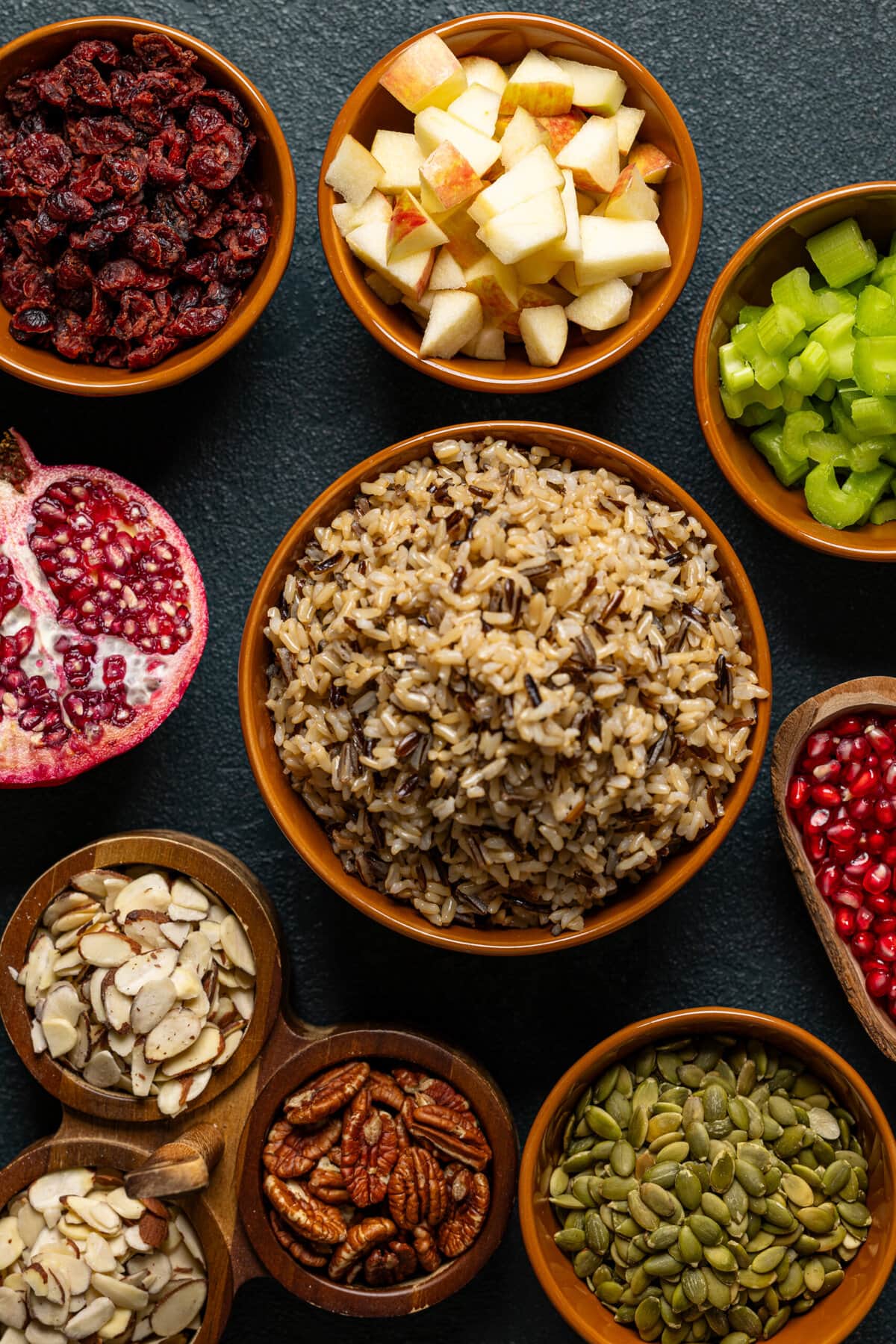 Ingredients on a table in bowls lined together.