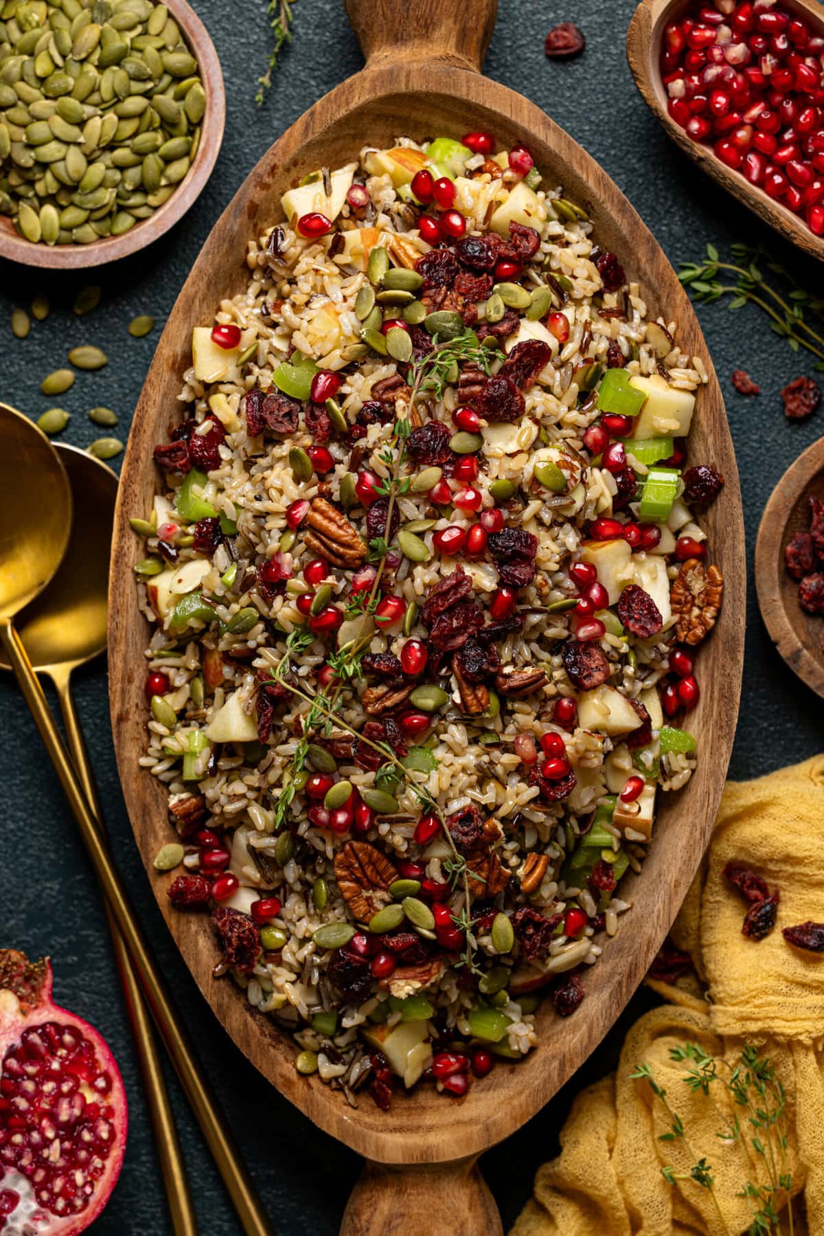 Stuffing in a wooden serving bowl with gold and gold 