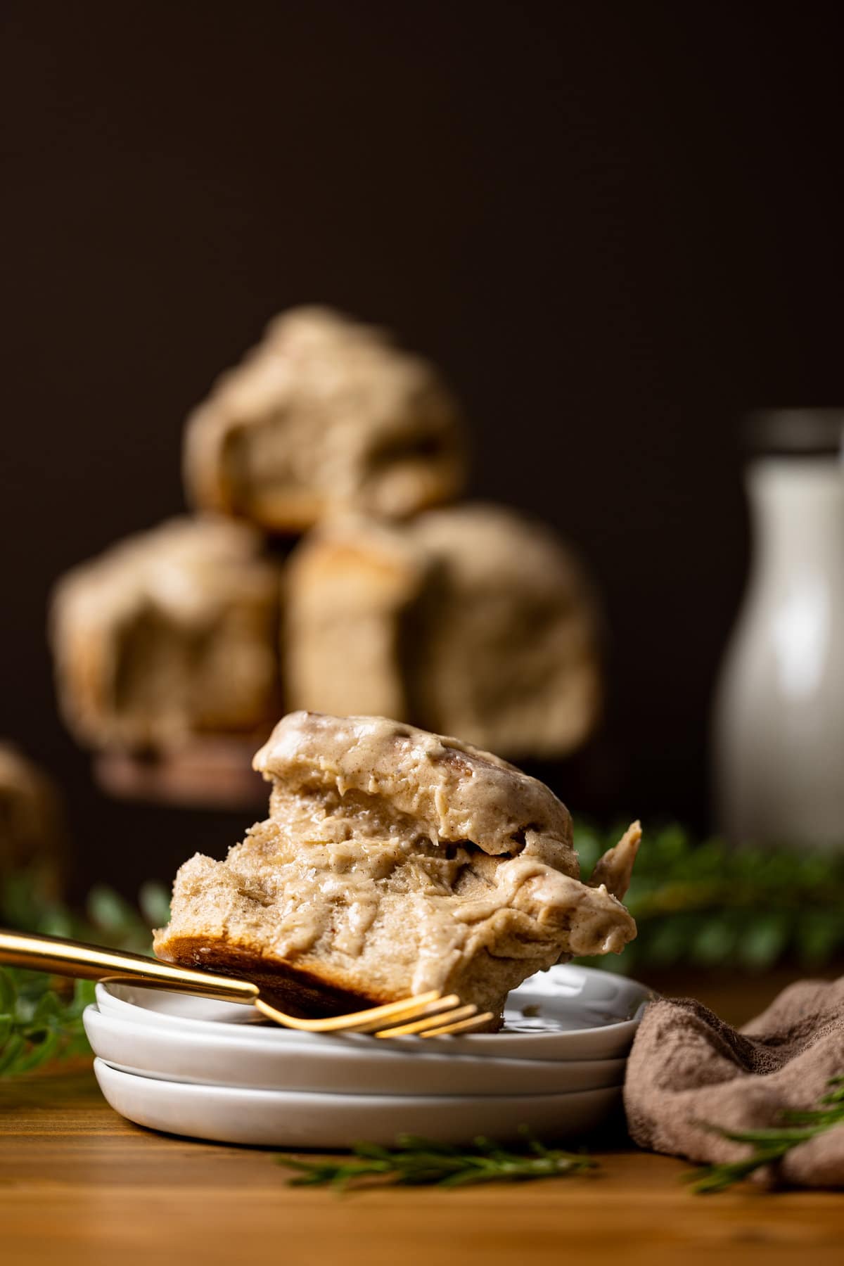 Half-eaten Vegan Chai Latte Cinnamon Roll