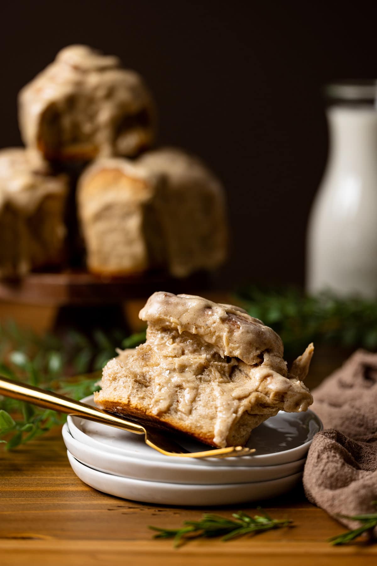 Half-eaten Vegan Chai Latte Cinnamon Roll