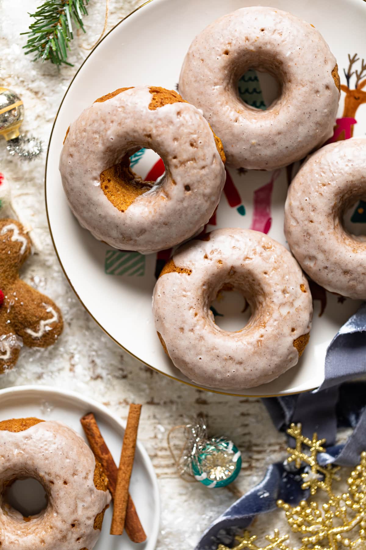 Vegan Gingerbread Donuts with Chai Glaze on a reindeer plate.