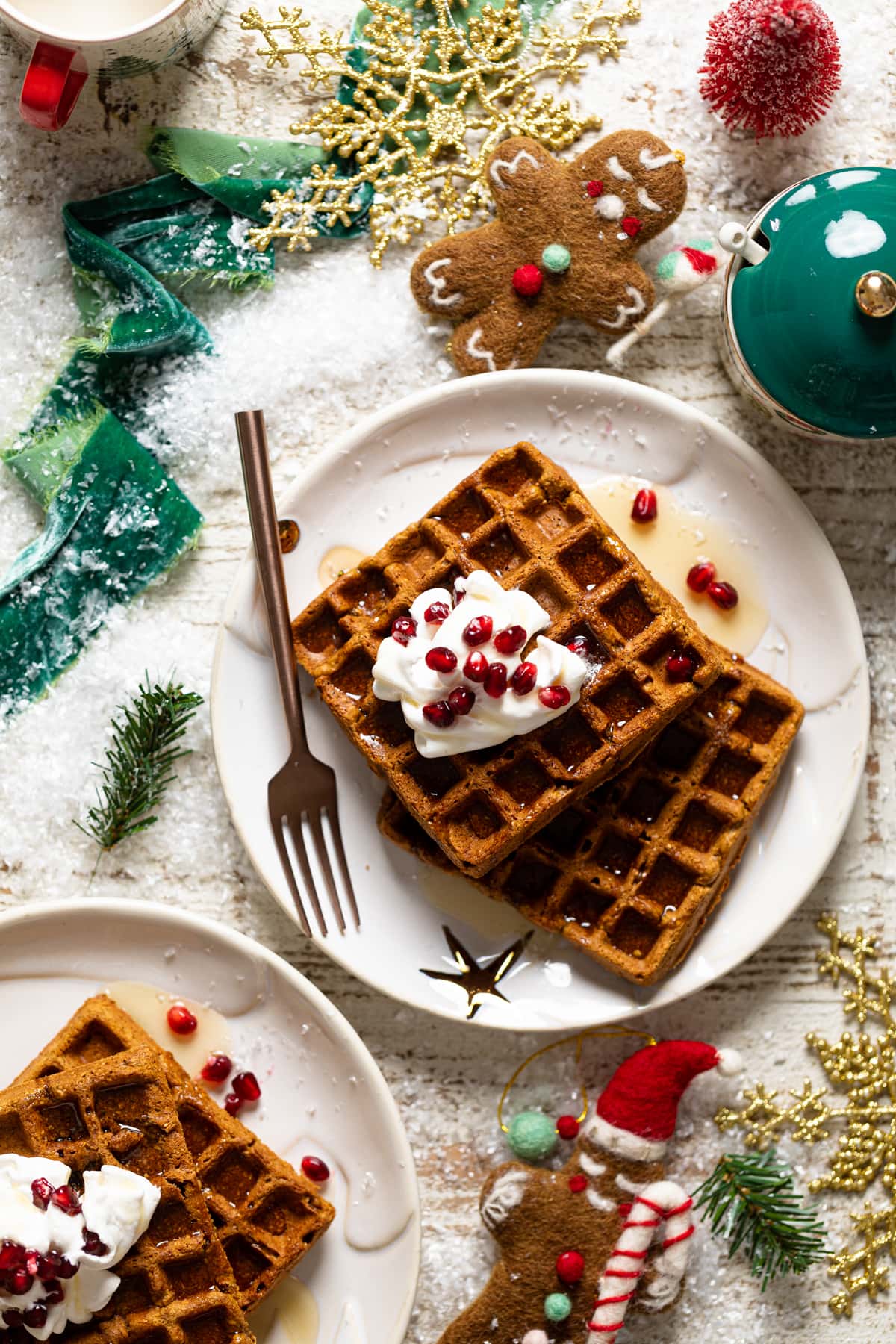 Gluten-free Flourless Gingerbread Waffles on two plates.