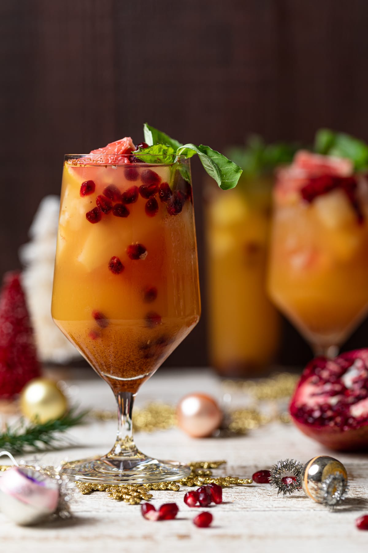 Pomegranate arils floating in a Honey Grapefruit Mocktail