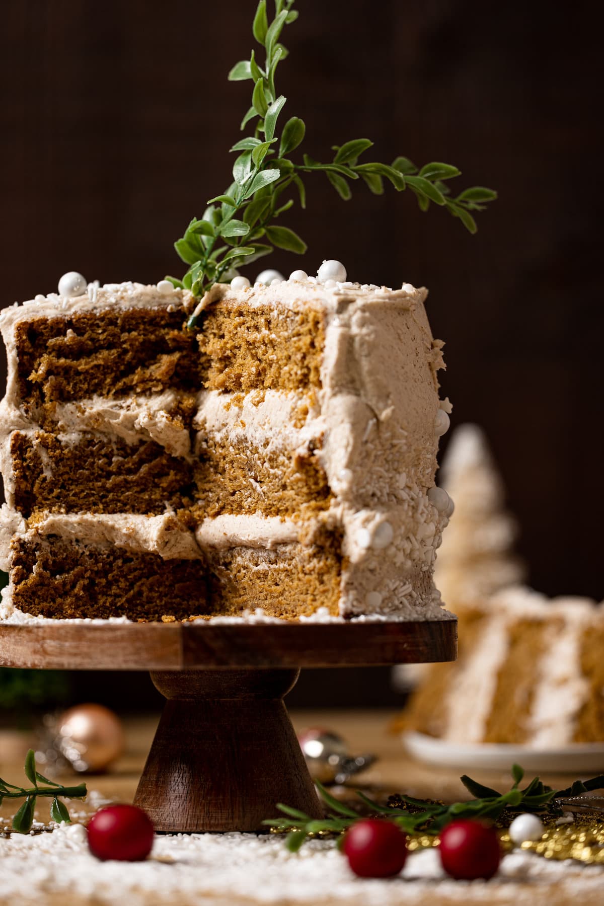 Closeup of Vegan Gingerbread Cake with Chai Buttercream missing a slice