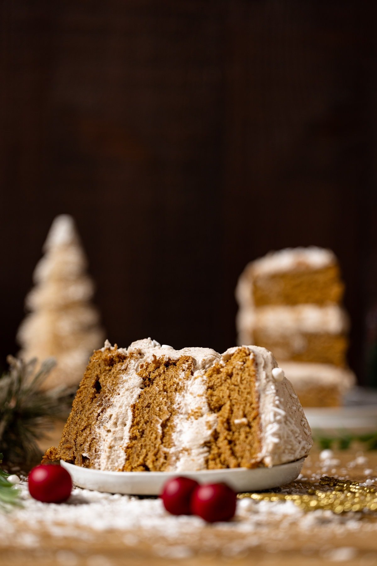 Slice of Vegan Gingerbread Cake with Chai Buttercream on a plate