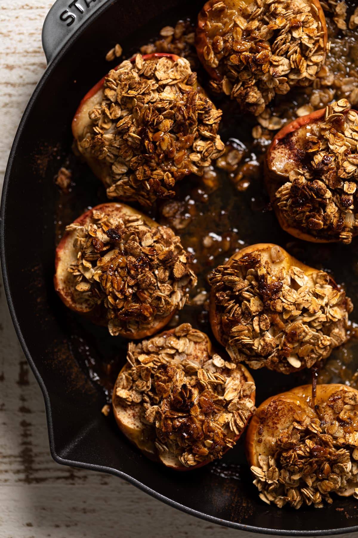 Vegan Baked Cinnamon Caramel Apples in a skillet.