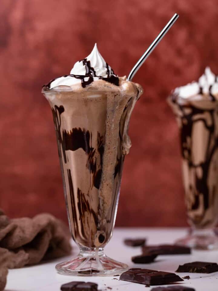 Dairy-Free Peanut Butter Chocolate Milkshake in a tall glass.