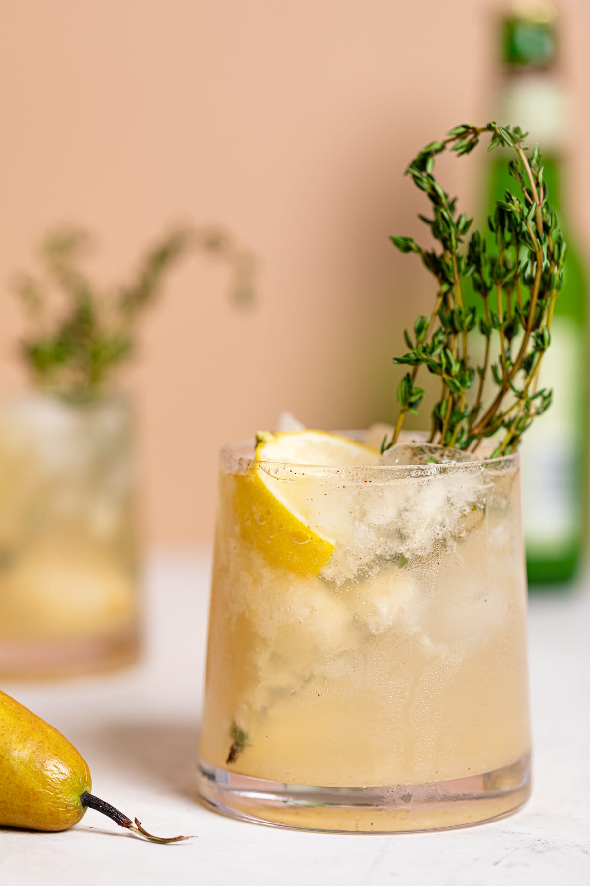 Pear Ginger Lemon and Thyme Drink in a small glass