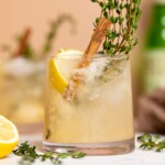 Pear Ginger Lemon and Thyme Drink in a small glass