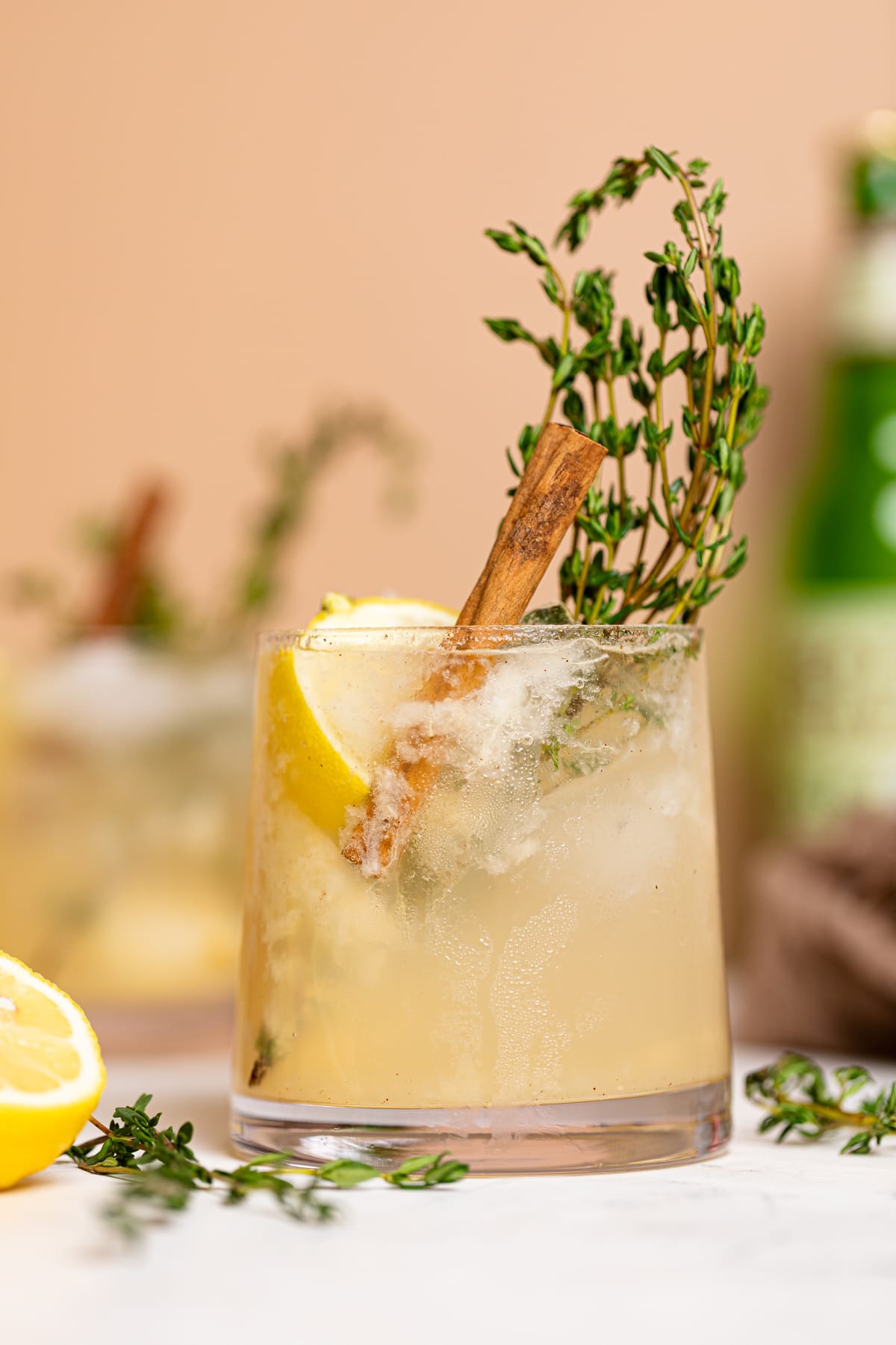 Pear Ginger Lemon and Thyme Drink in a small glass