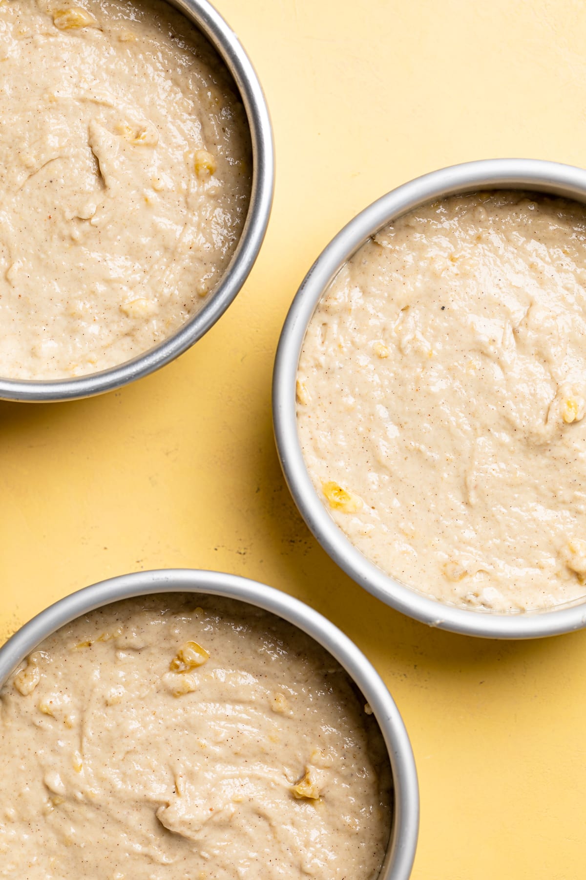 Three round plates with Vegan Banana Cake batter