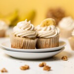 Banana Cupcakes with Maple Buttercream on a plate.